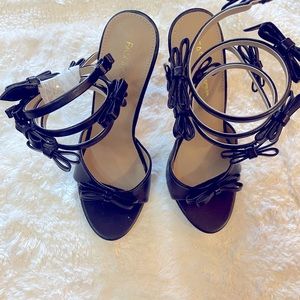 Black coil wrap strap high heels. Size 9